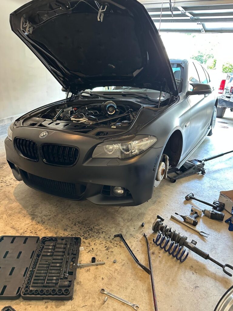 mobile mechanic lower suspension struts bmw 
