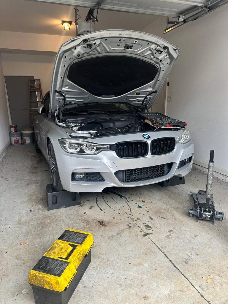 Mobile mechanic performing on-site auto repair in Marietta, GA